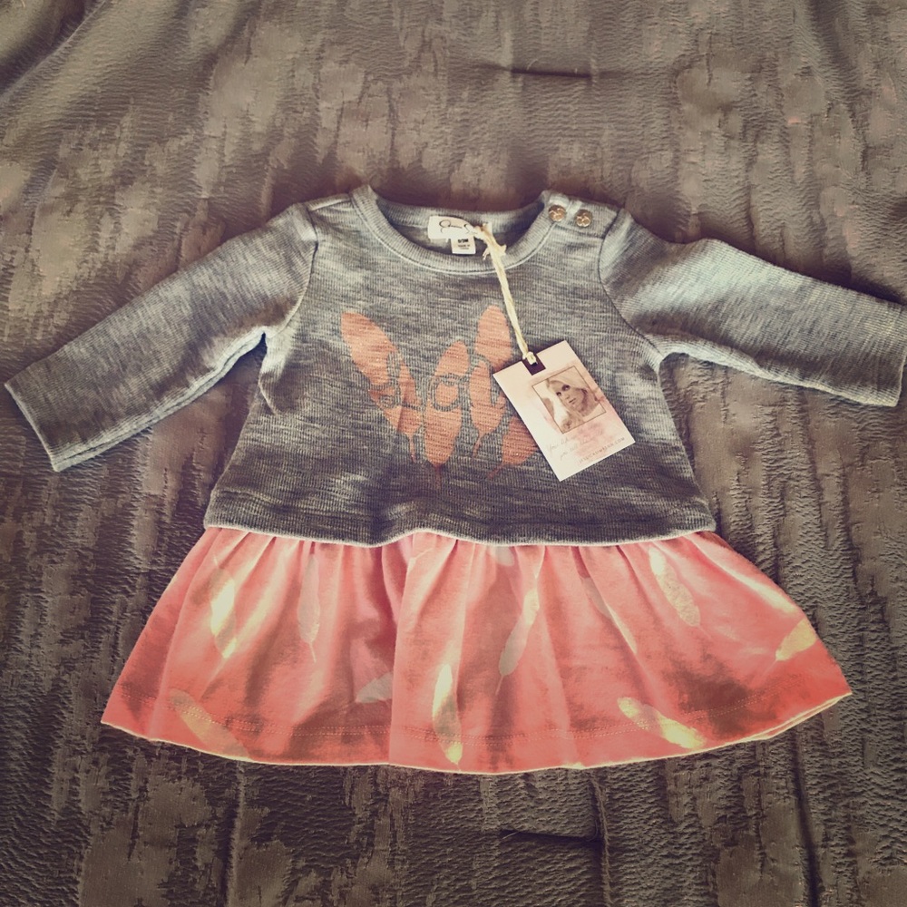 Jessica Simpson top with tags
